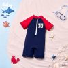 Goldbee - Bộ bơi liền phối màu tay raglan ilaby - đỏ xanh than